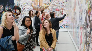 People admiring art