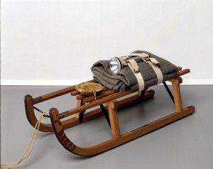 Joseph Beuys - Schlitten, 1969, wooden sled, felt, belts, flashlight, fat and rope; sled stamped with oil paint (Browncross)