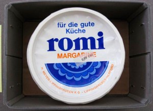 Joseph Beuys - Wirtschaftswert APOLLO, 1977, margarine container and postcard