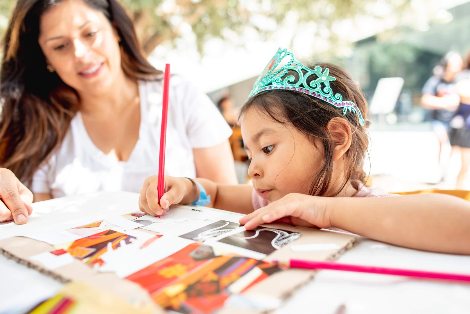 Photo of child and woman at Family Weekend Workshops.